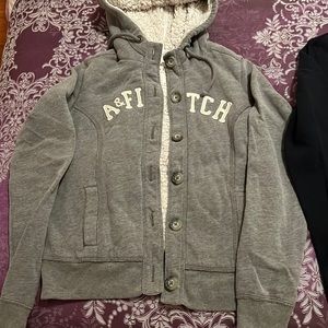 Hoodies at good condition much be buy two together size M color Navy and grey